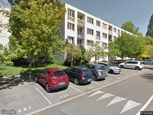 APPARTEMENT AVEC UN GRENIER, UN GARAGE ET UNE PLACE DE PARKING