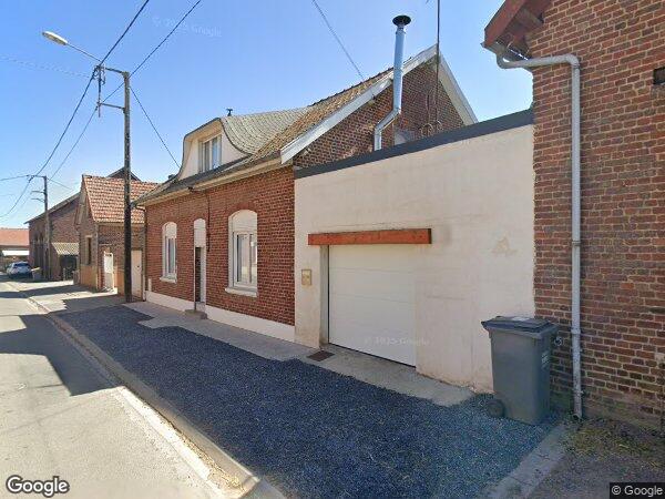 UN IMMEUBLE À USAGE D'HABITATION à Hermies